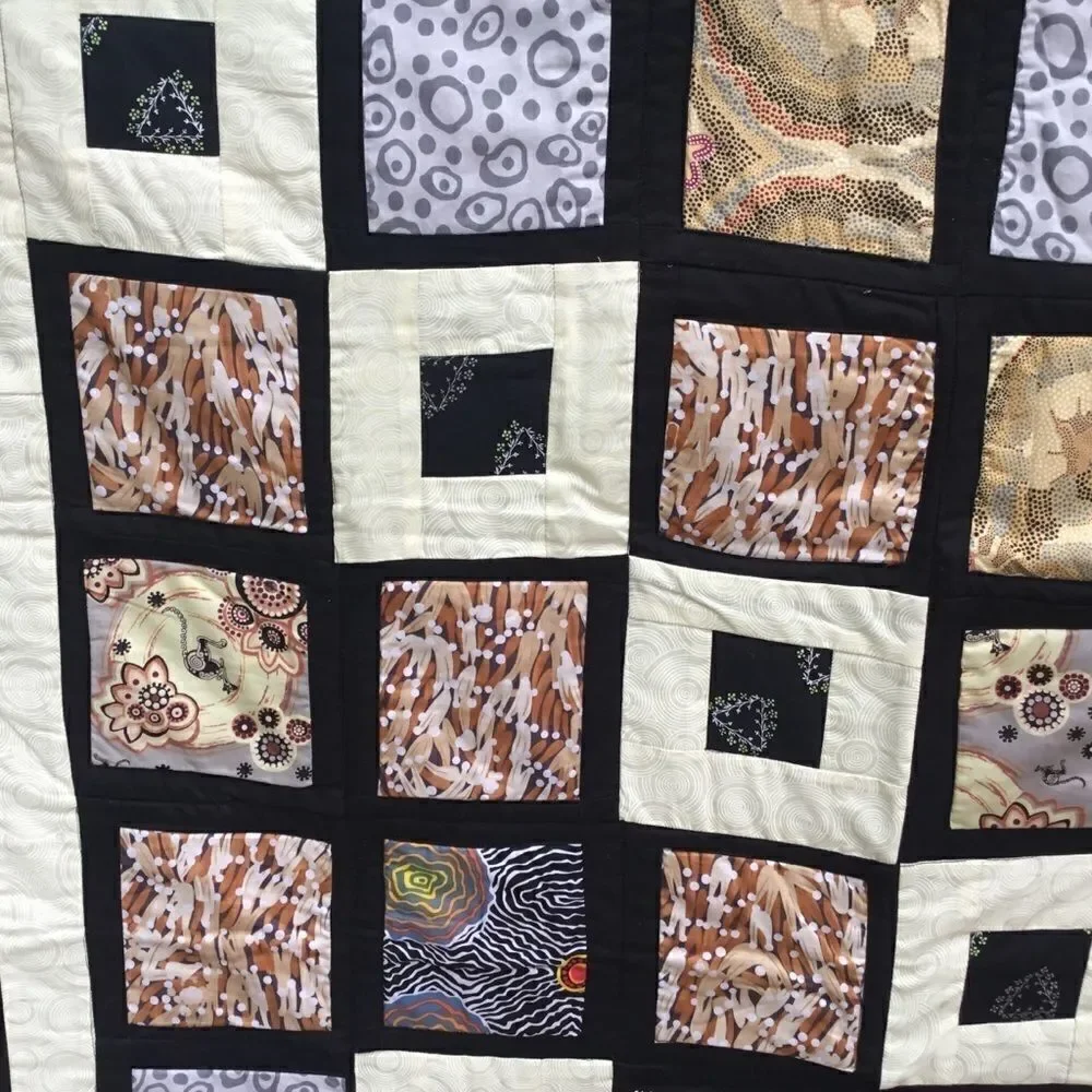 NWT. Hand Crafted Aboriginal Prints Quilt